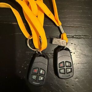 Black Key Fobs with Yellow Lanyards